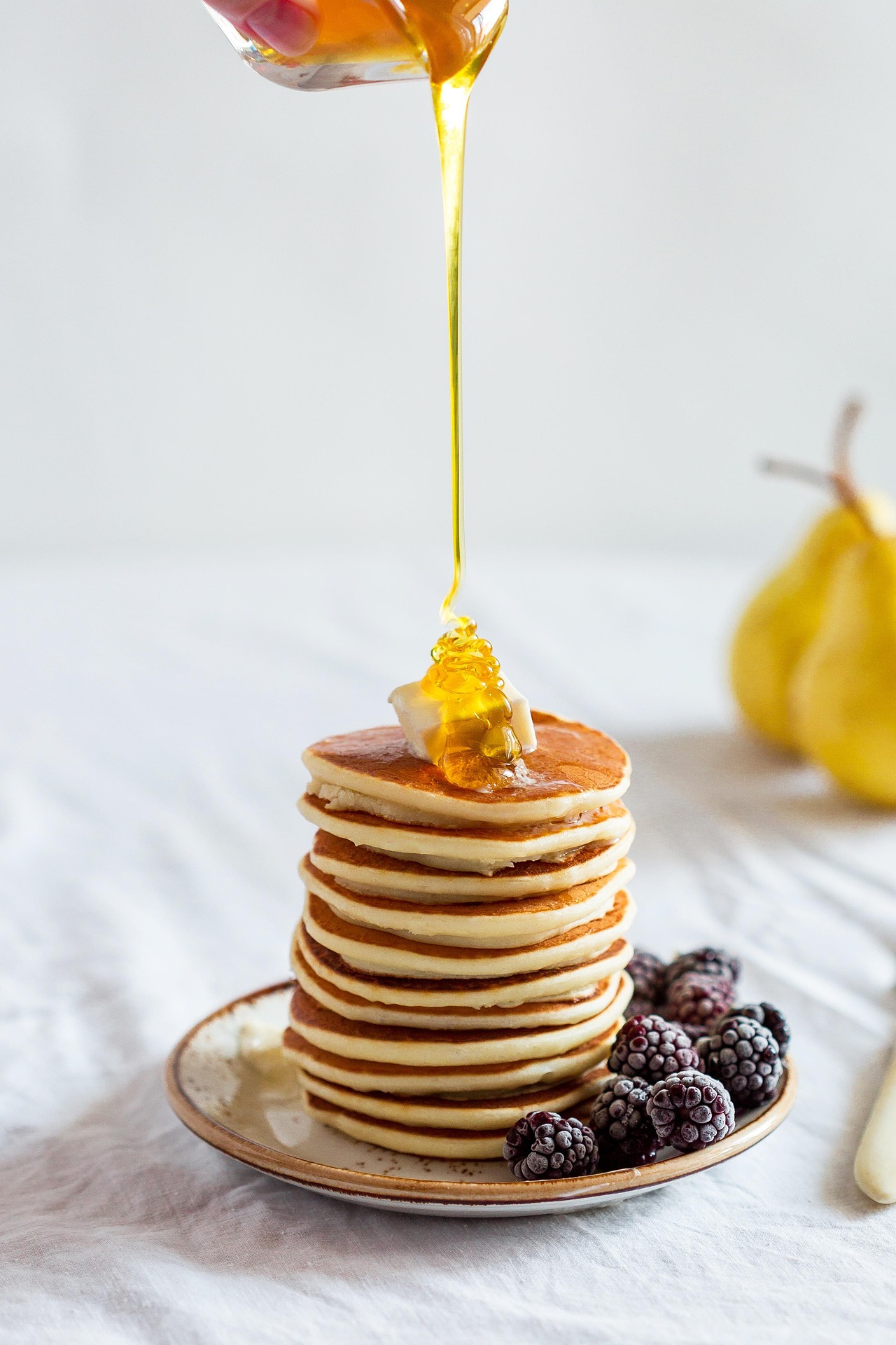 Yummy pancakes drizzled in honey